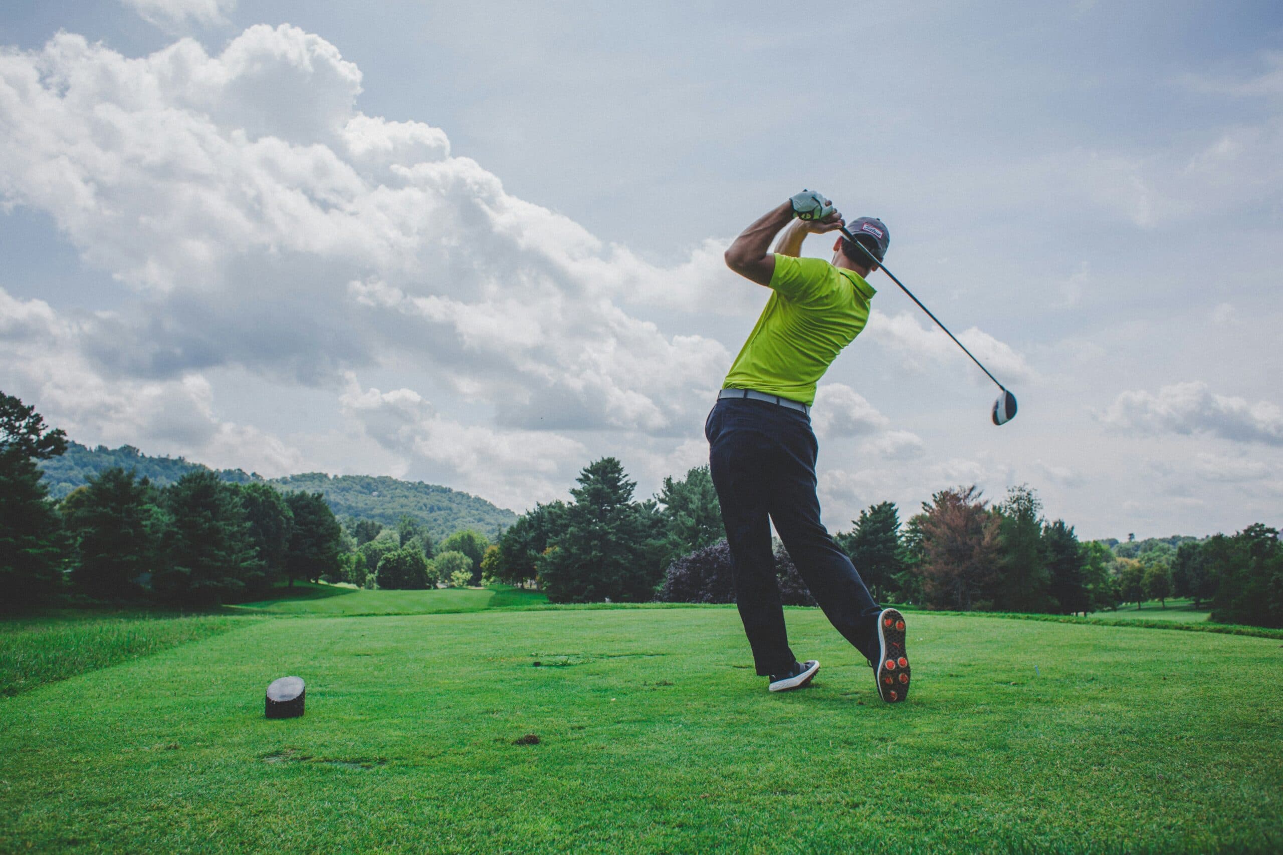 Golfer mid-swing